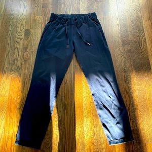 Lululemon black size 4 high rise On The Fly Pants 7/8 length